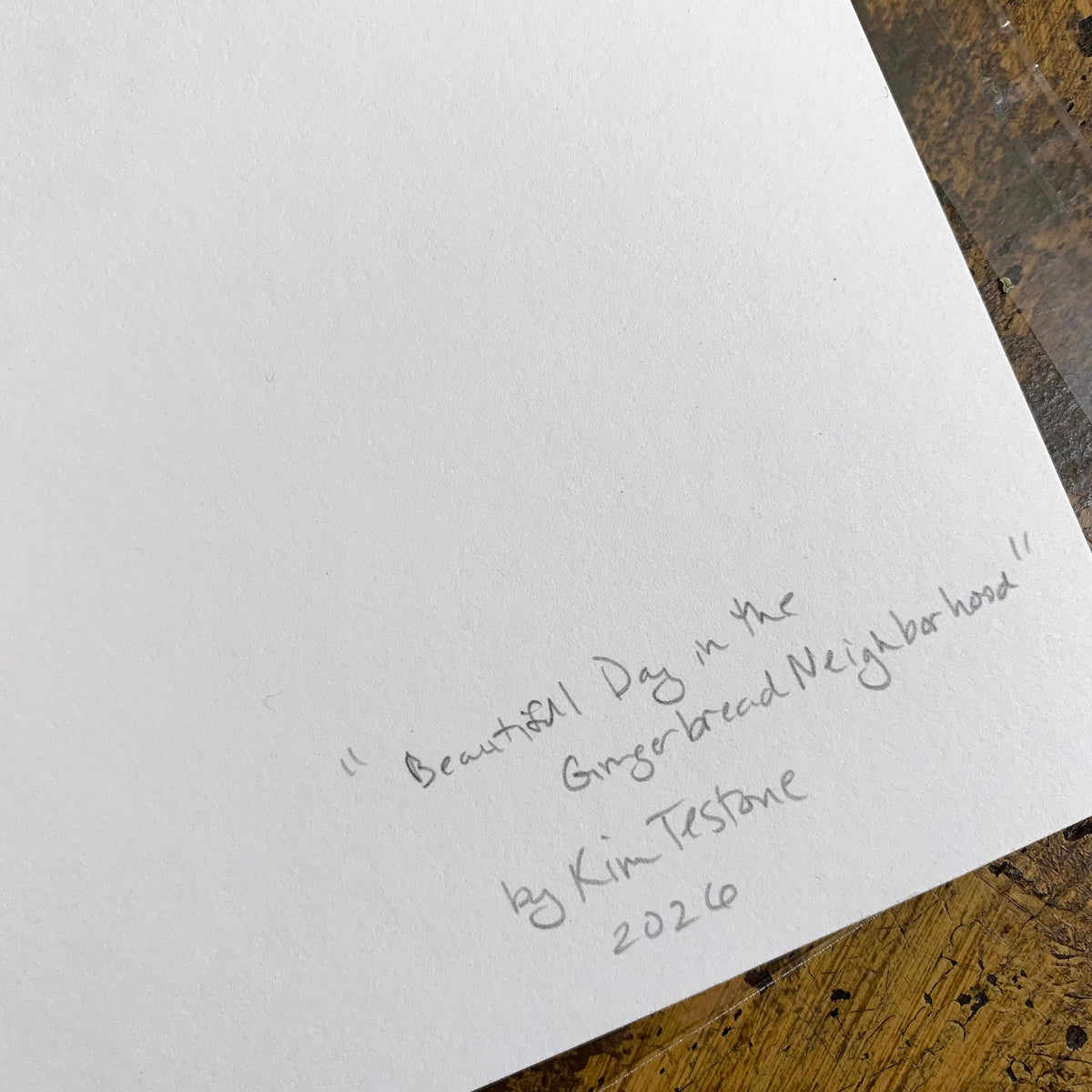 Handwritten title 'Beautiful Day in the Gingerbread Neighborhood' signed by Kim Testone, 2020
