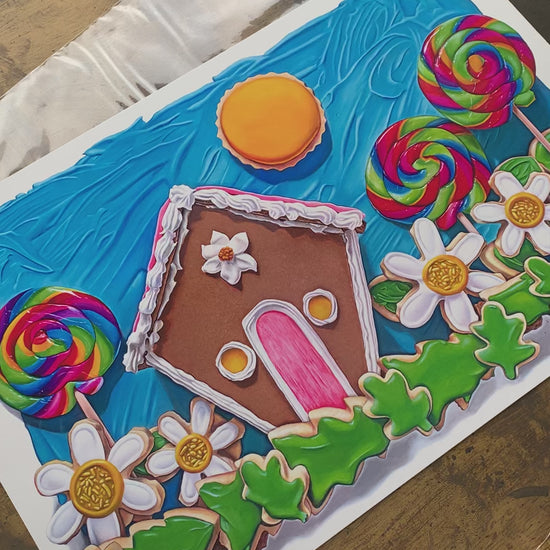 Here Comes the Sun art print by Kim Testone, based on an original ttrompe l'oeil painting of a gingerbread house among field of cookie flowers and grass, three swirly lollipops and a cookie sun, with a blue frosting sky.